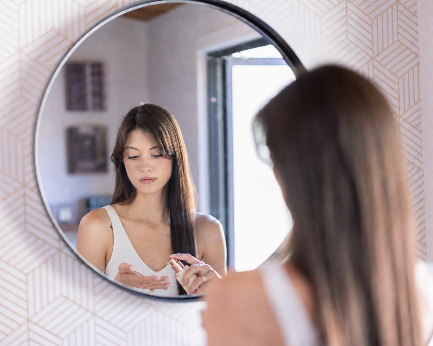 Woman incorporating skincare into her daily routine