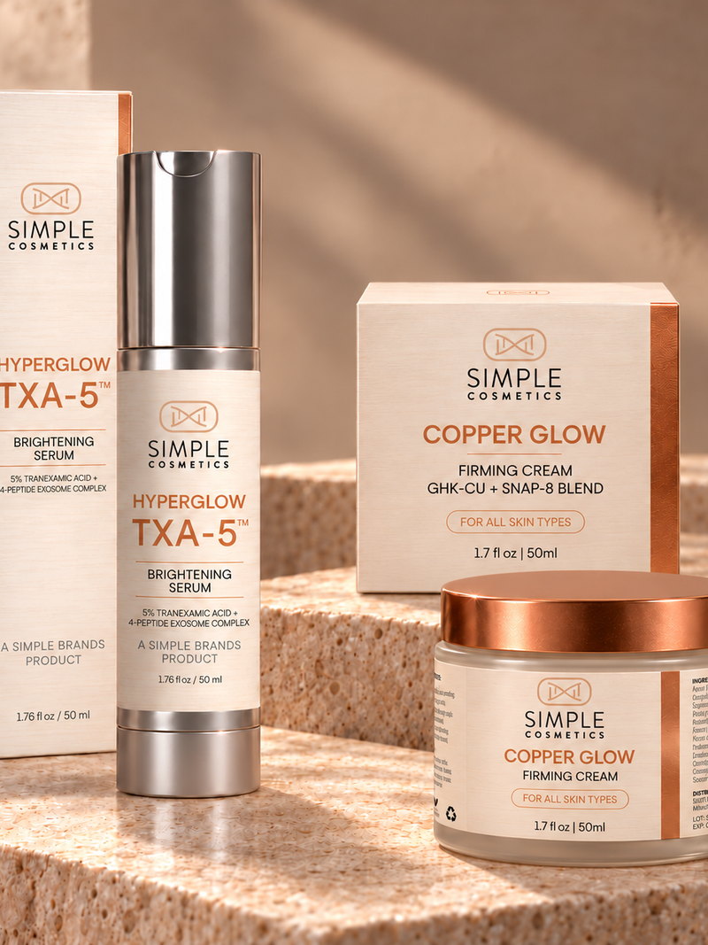 Glow Duo with HyperGlow TXA-5 Brightening Serum and Copper Glow Firming Cream on warm stone platforms, with the Copper Glow jar positioned to the right and its Simple Cosmetics logo facing forward.